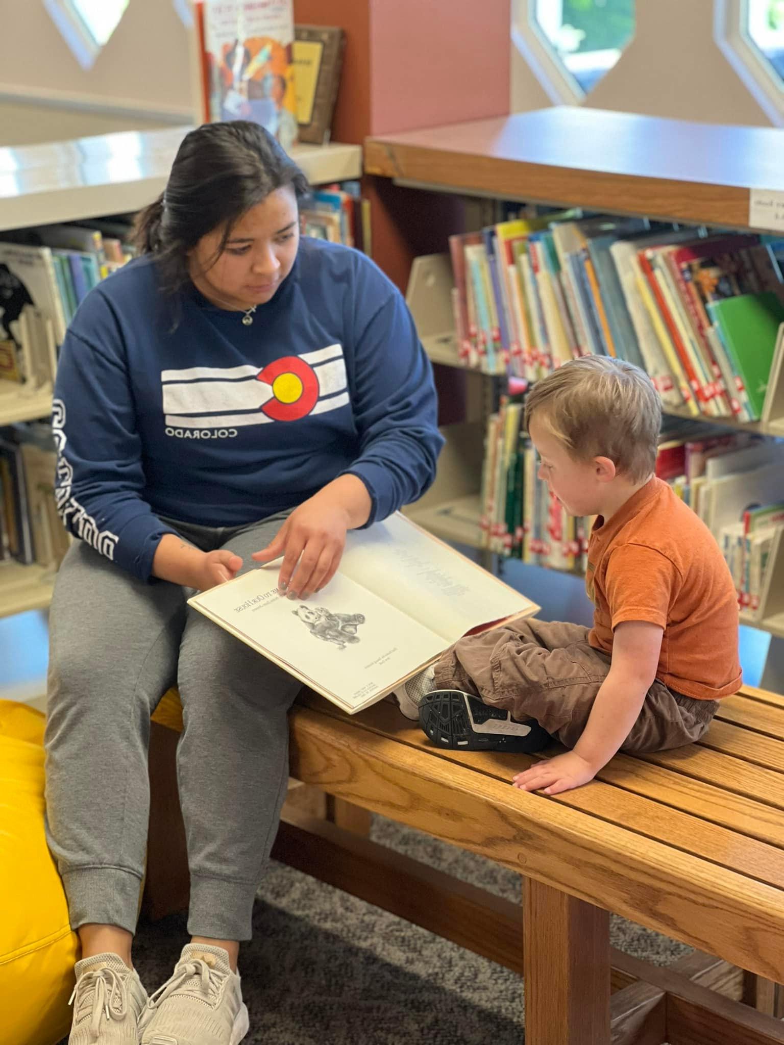 Teacher Reading to Child